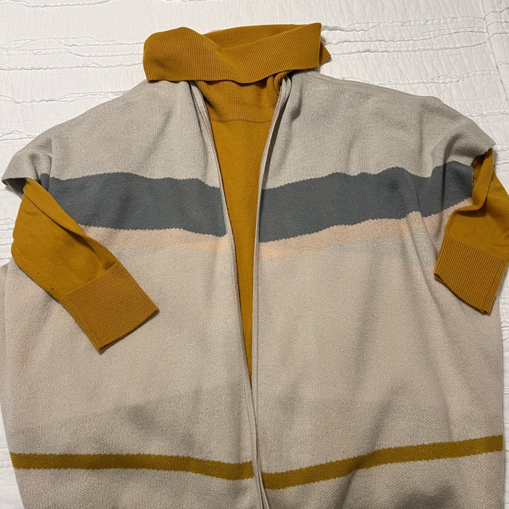 Funky and fun cardigan and turtle neck sweater.